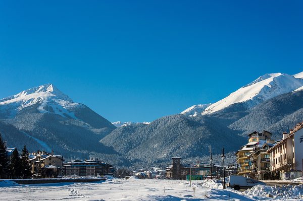 Snowcapped Pirin Mountains above the town of Bansko in winter